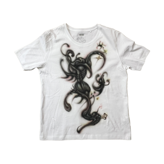 White t-shirt with a black dragon design on a white background