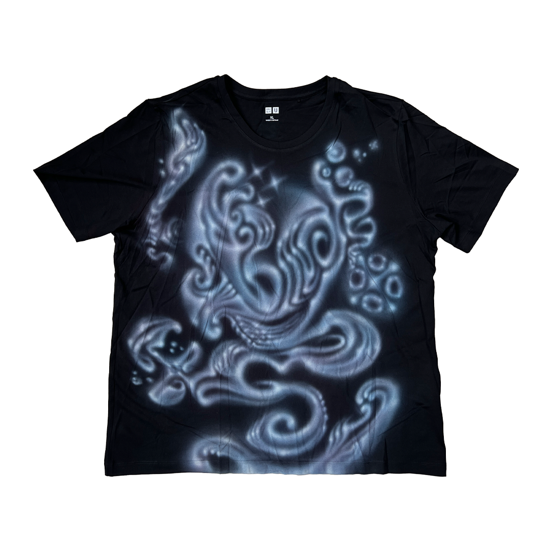 Black t-shirt with a white octopus design on a white background