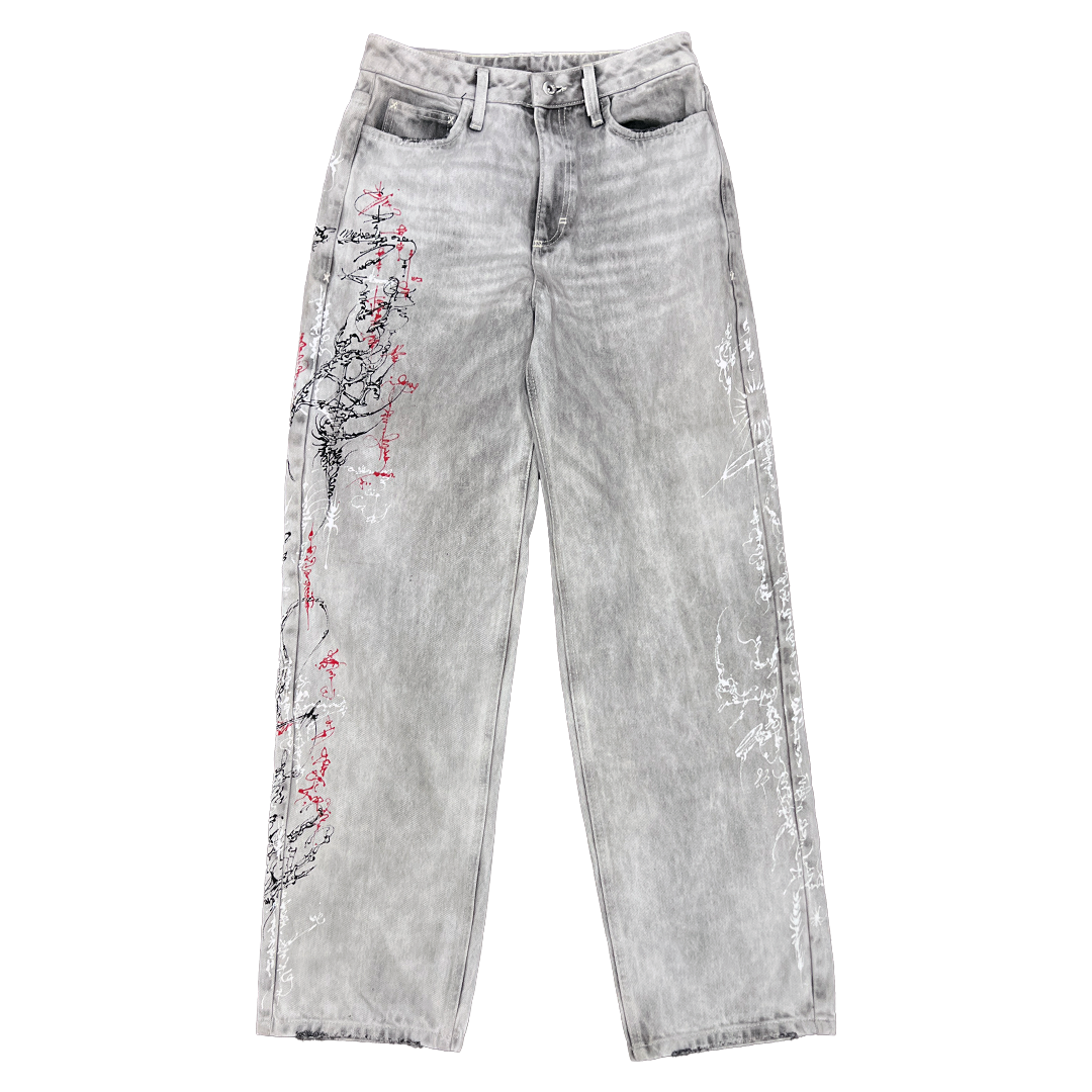 Gray jeans with red floral embroidery on a white background